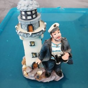 Faro con marinaio si illumina altezza 15 cm