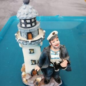 Faro con marinaio si illumina altezza 15 cm